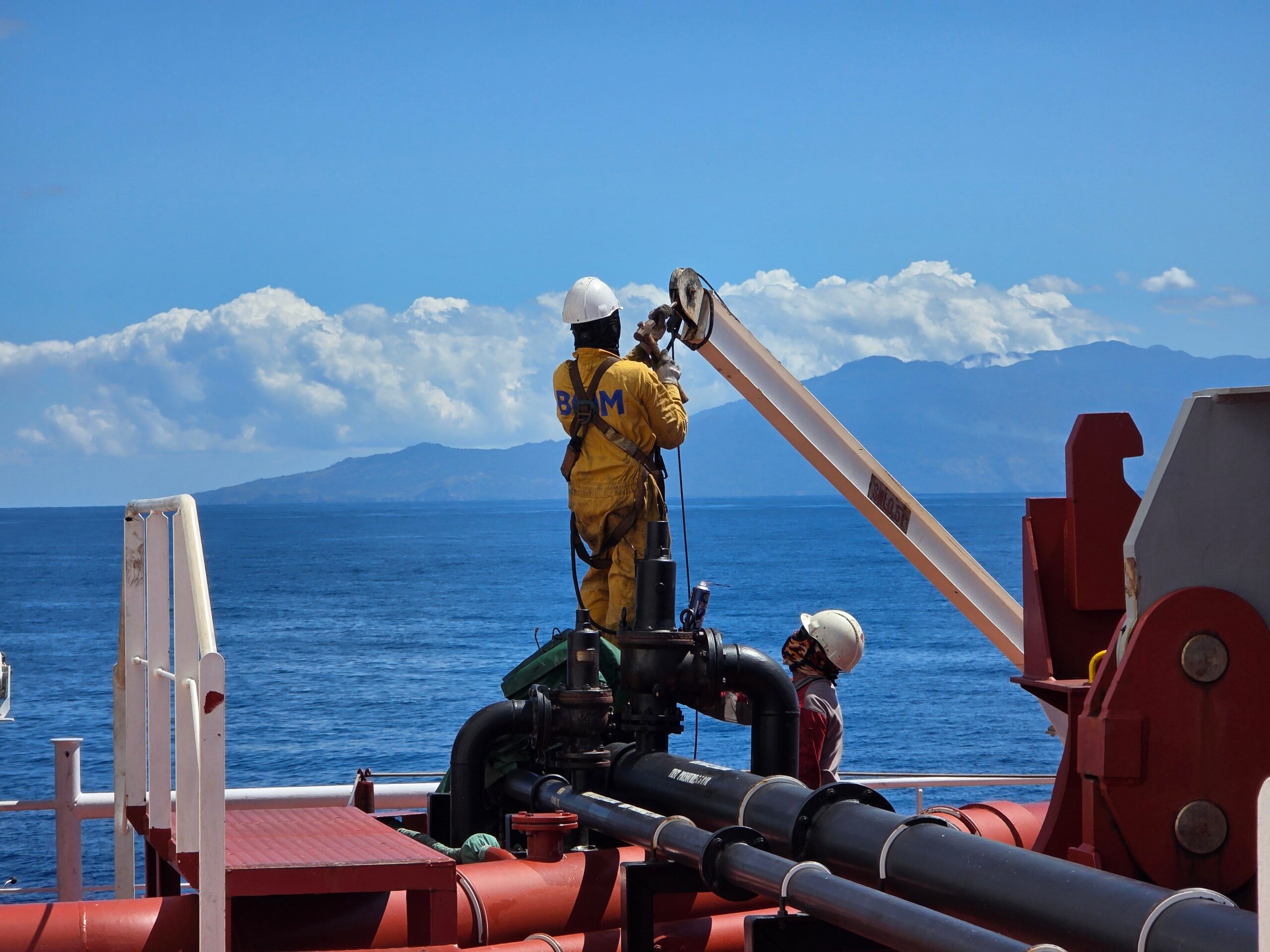 Workers on an offshore platform deck