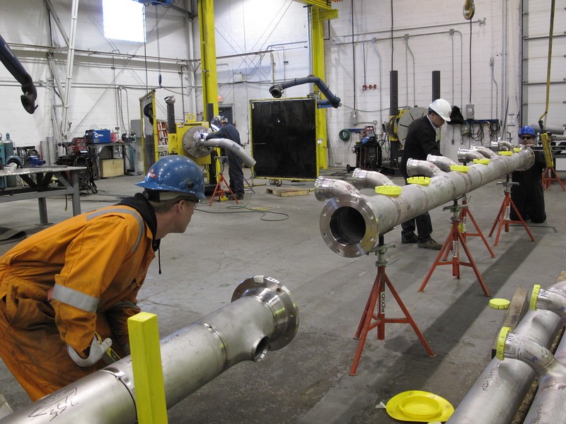 Pipe spool fabrication in a workshop