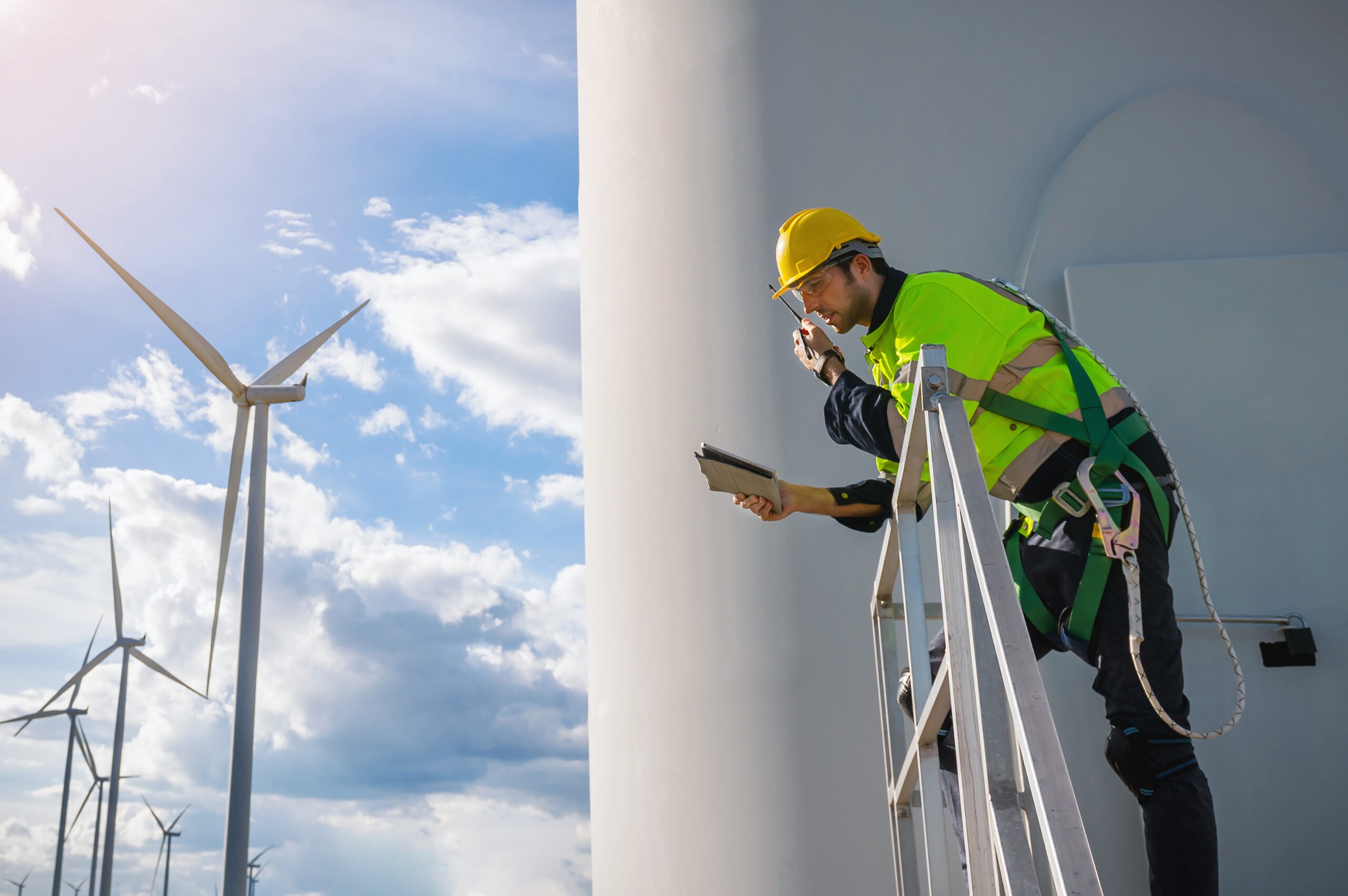 Technician working on a wind turbine